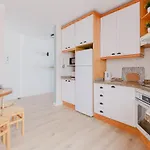 Acogedor En *